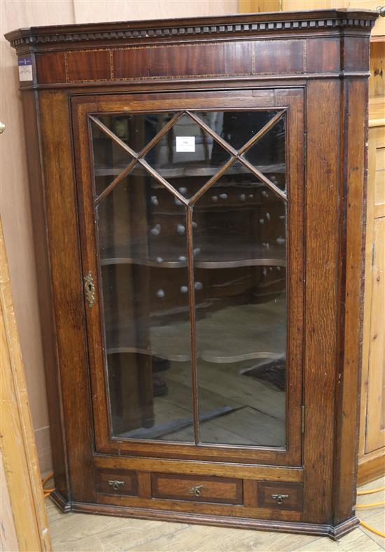 An oak Georgian corner cupboard, W.81cm